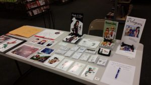 comic convention table set up