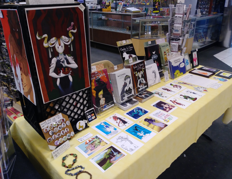 preparing to freelance full time image post of author appearance artist alley table setup